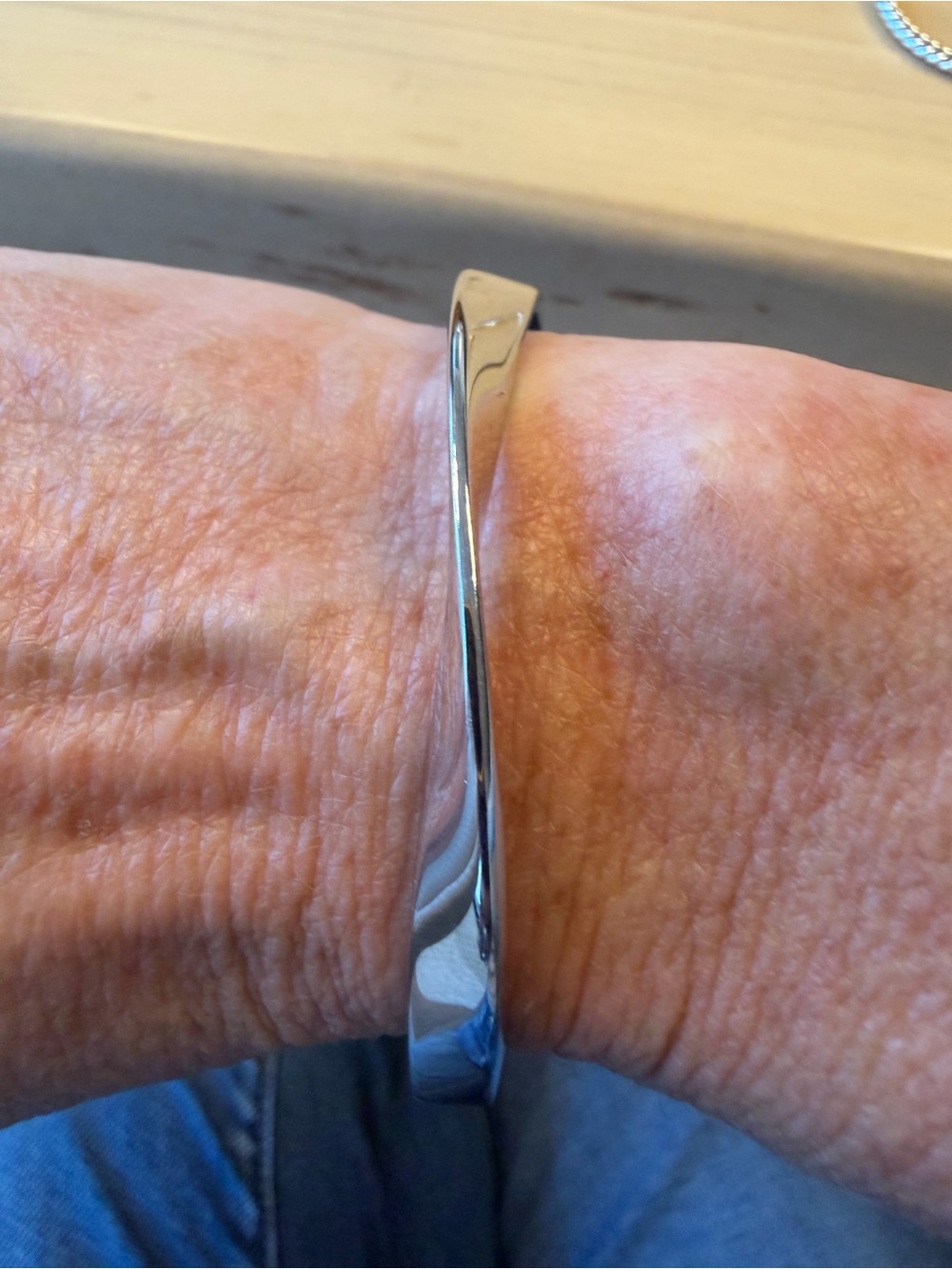 Kate Spade  Polished Silver-Tone Twist Bangle